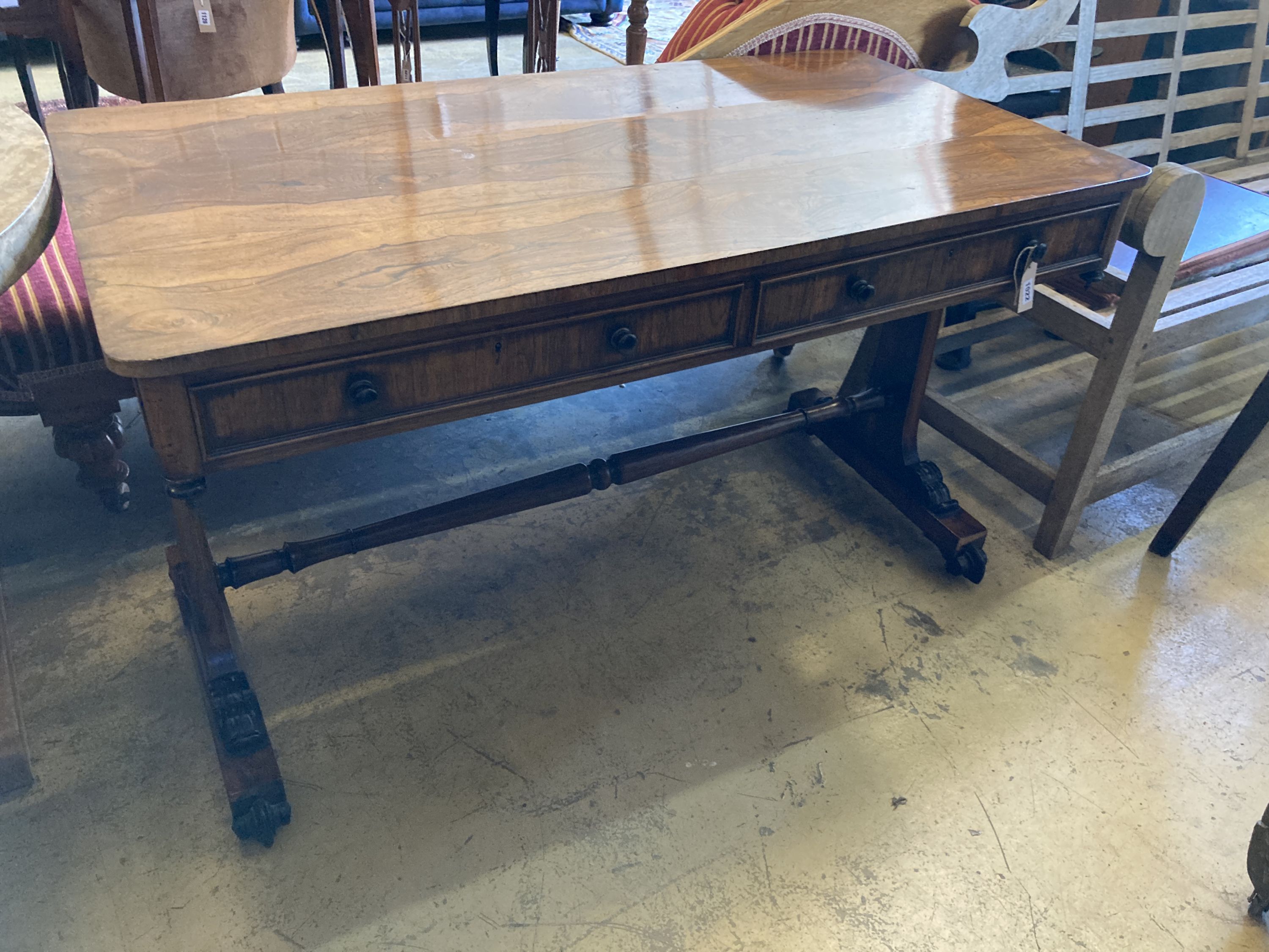 A Victorian rectangular rosewood two drawer library table, width 126cm, depth 66cm, height 76cm